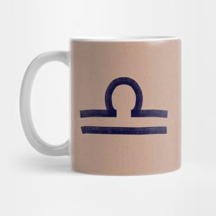 Libra on tan paper Mug